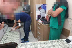 В Киеве трансплантолог, которого задержали на взятке в 22 тыс. долларов отделался лишь штрафом